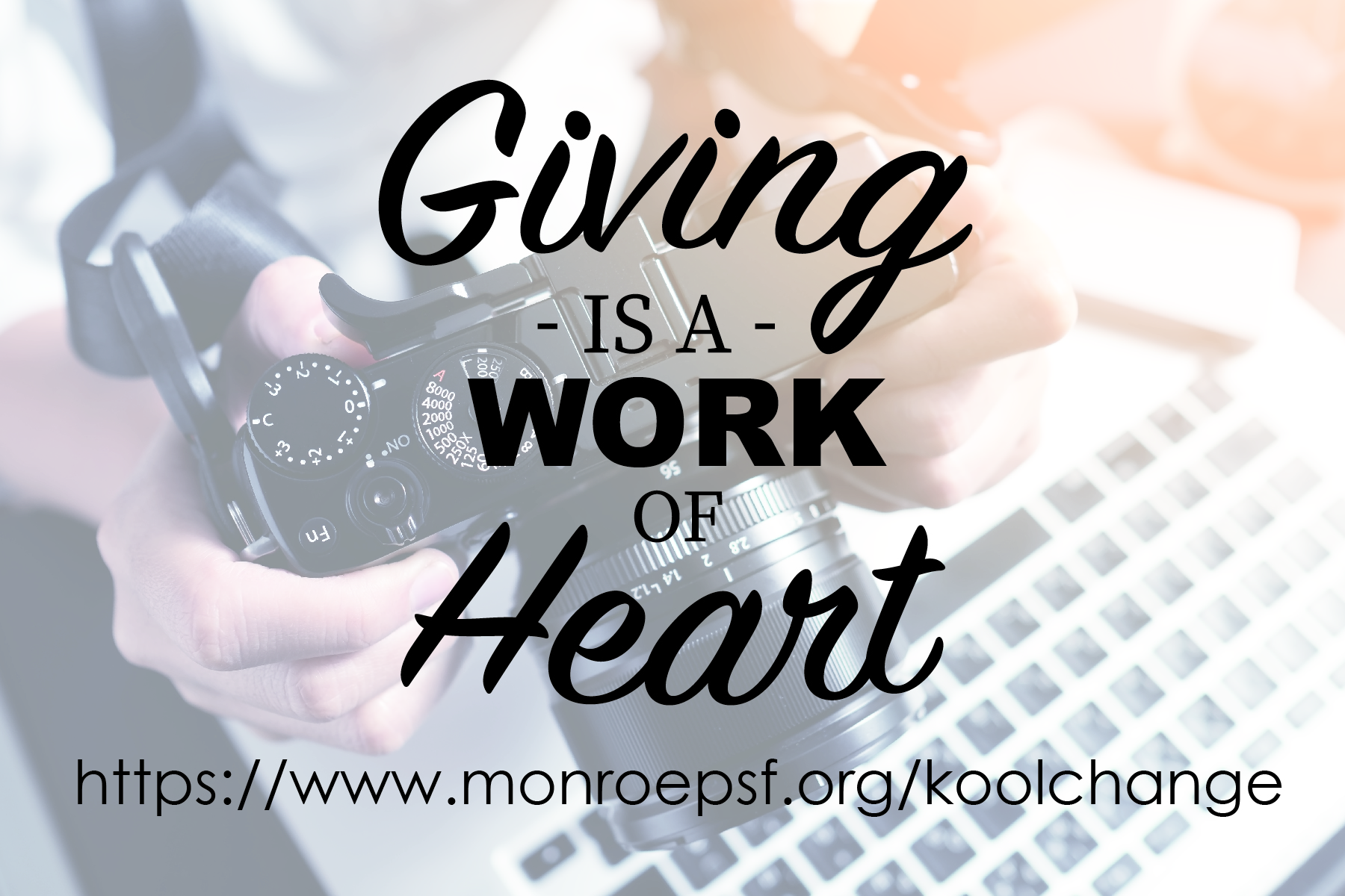 Promotional graphic reading “Giving is a Work of Heart” with a photographer holding a camera.