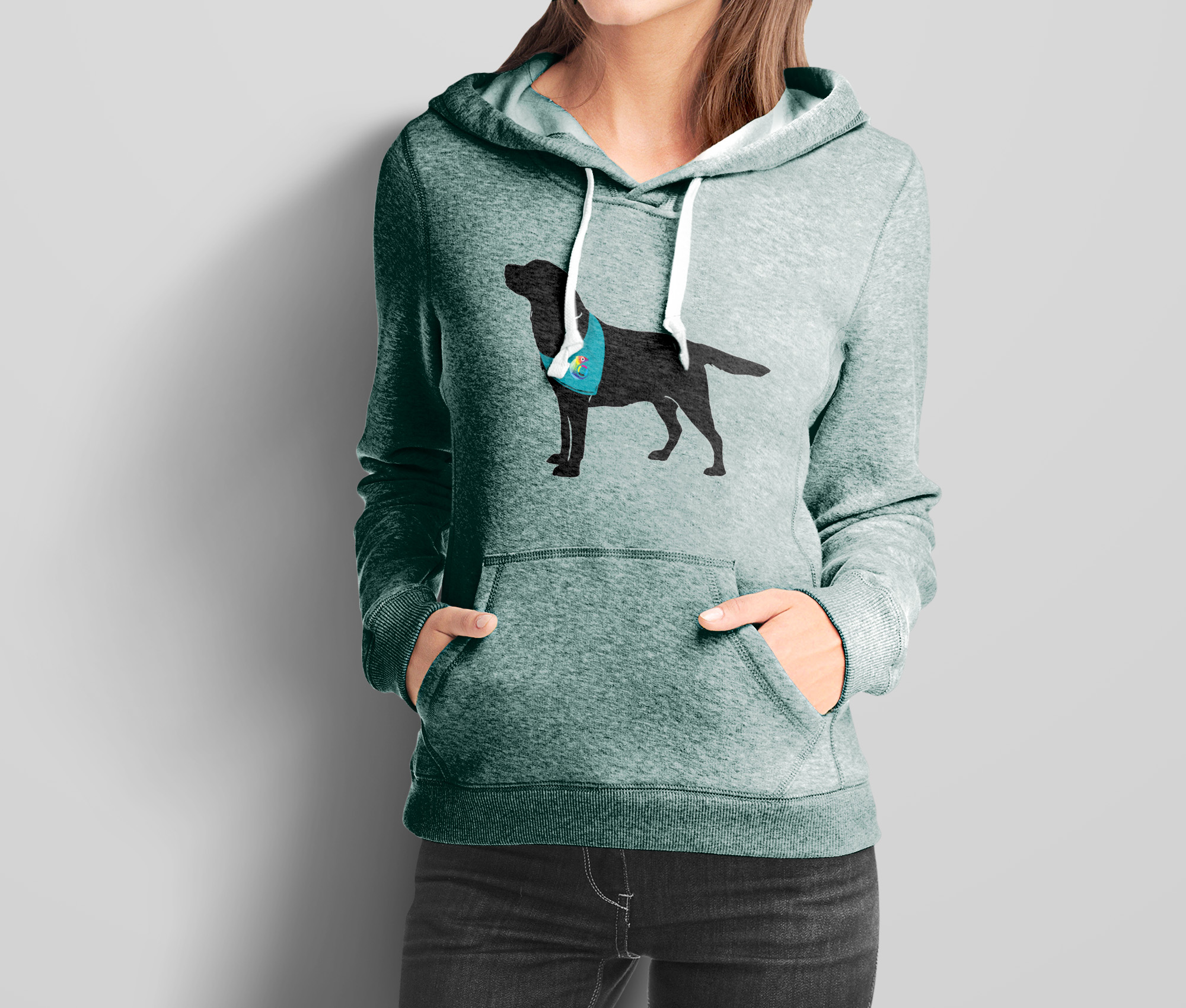 A heather-teal hoodie featuring an original black-lab silhouette illustration with a teal bandana.